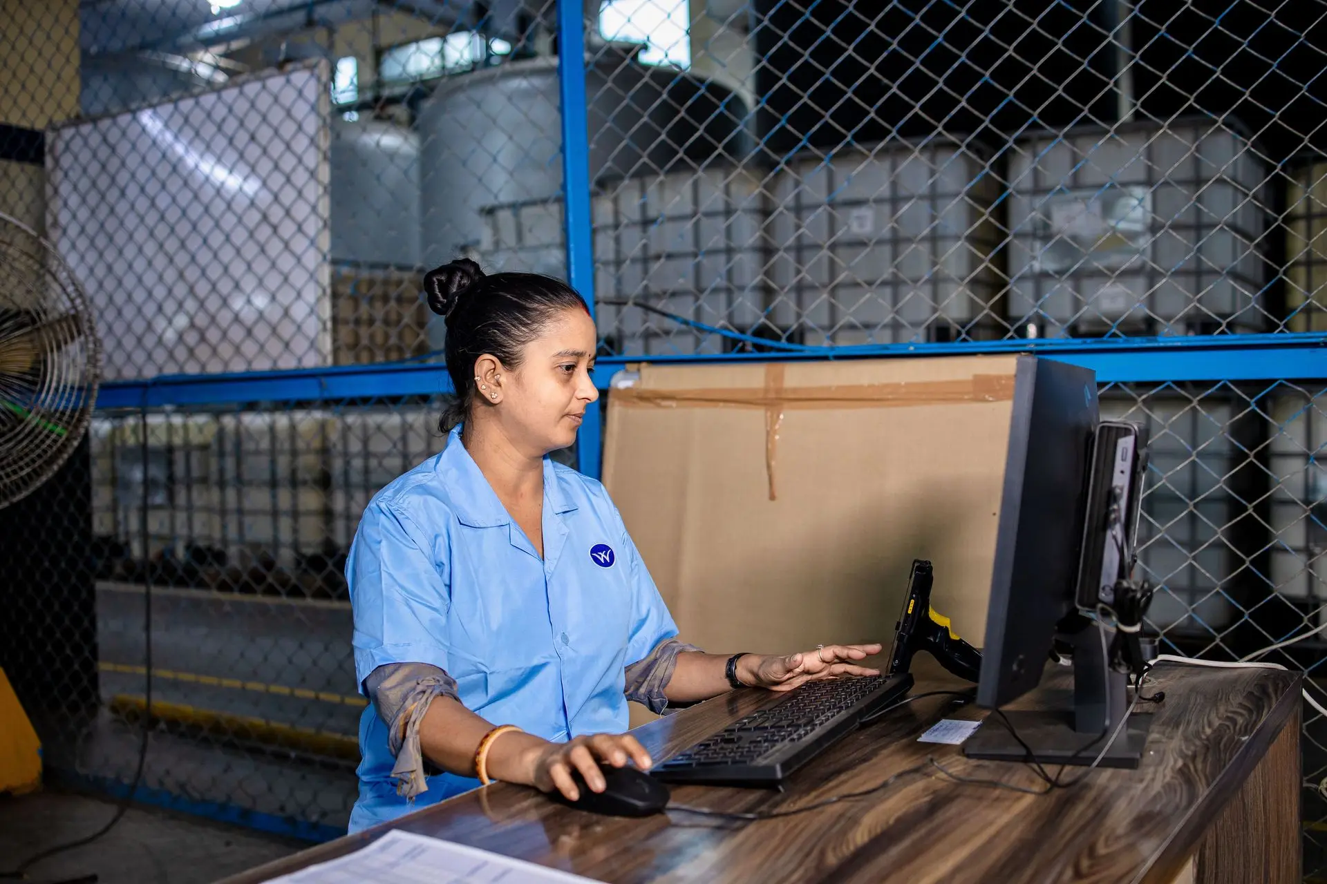 logistics manager working computer